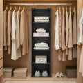 Closet with clothes organizer hanging on racks and shelves with folded garments and boxes.