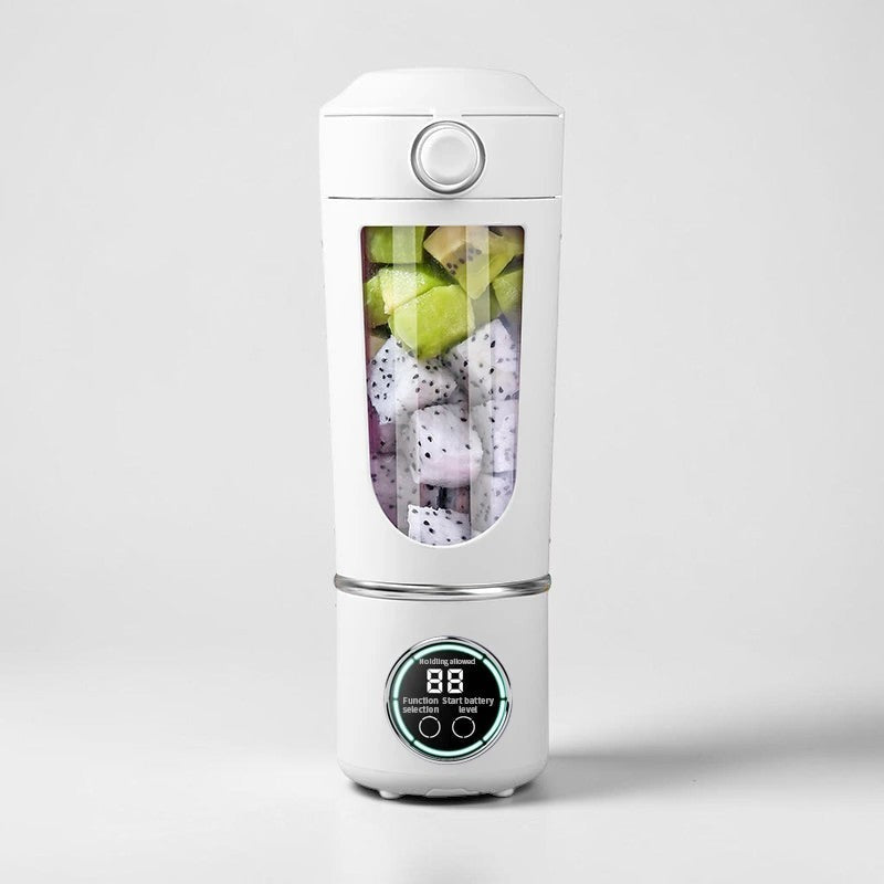 Tidings & Twinkle BlendPro Go white portable blender with 700ml capacity, filled with kiwi and dragon fruit.
