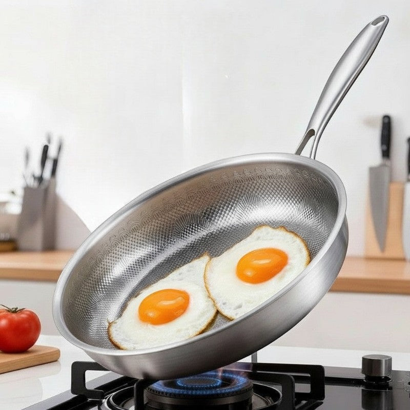 Tidings & Twinkle 11.8 inch hammered titanium frying pan with non-stick surface and ergonomic handle.