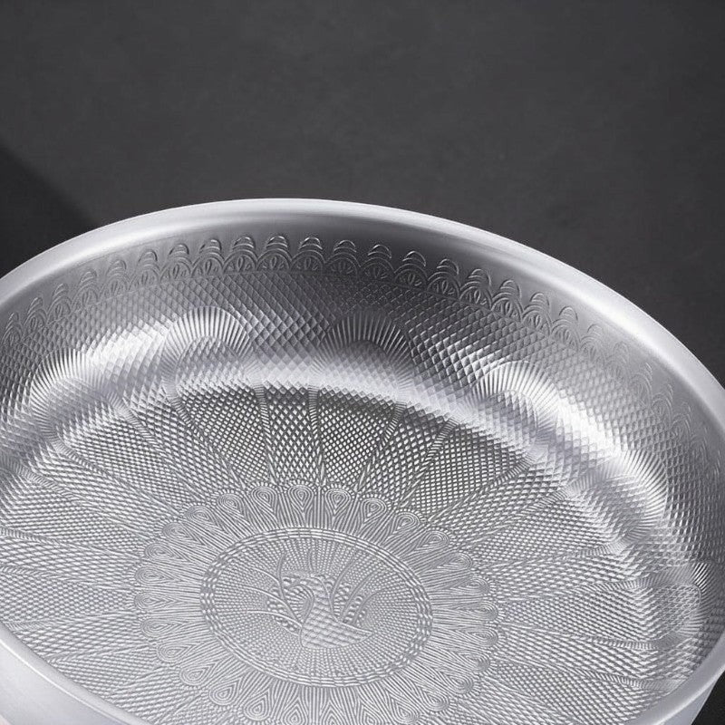 Tidings & Twinkle ForgeCore titanium frying pan with hammered non-stick design and peacock motif.
